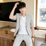 Premium men's short-sleeve suit set—a stylish, slimming ensemble perfect for bosses, hairstylists, or grooms seeking a sharp, sophisticated look.